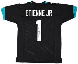 Travis Etienne Jacksonville Signed Black Football Jersey BAS - Sports Integrity